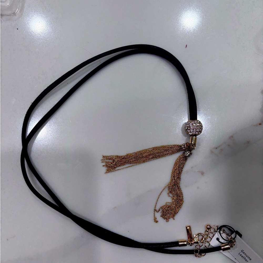 Gorgeous sparkly lariat necklace with genuine, leather crystals, and tassels